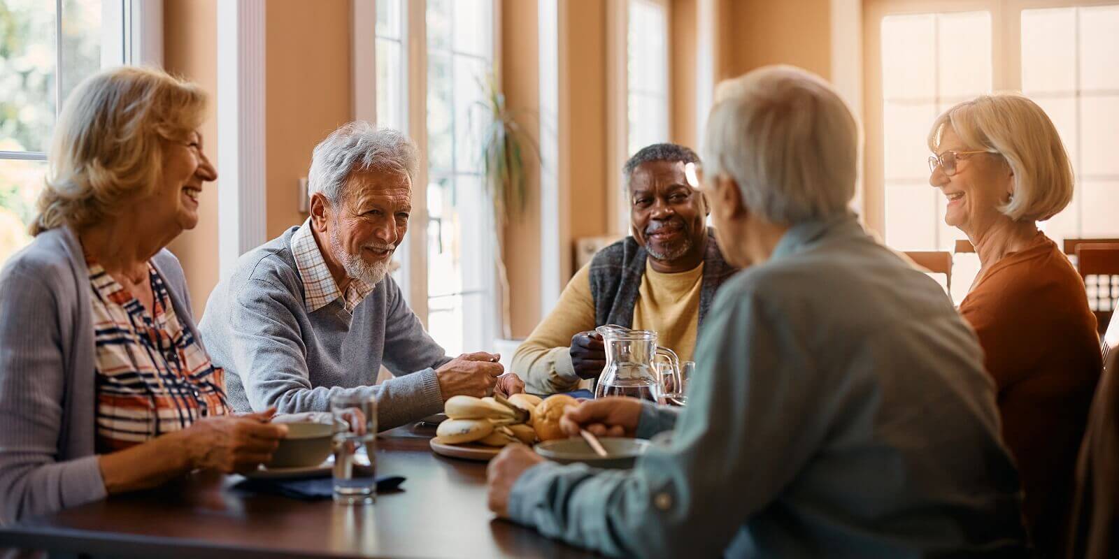 senior-friends-having-conversation